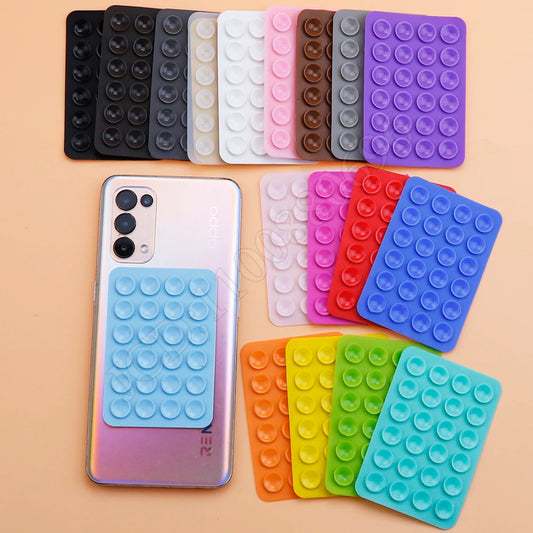 Support adhésif silicone multifonction pour smartphone – Pliable & repositionnable